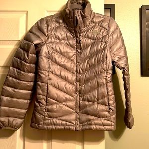 The North Face puffy jacket.